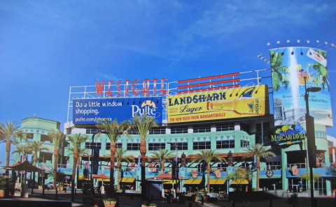 A painting of a building with palm trees commissioned by MKB Construction Services.
