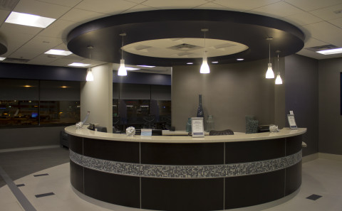 A circular reception area in a medical office designed and constructed by MKB Construction Services.